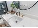 Vanity close up with marble countertops, gold fixtures, and decor at 6001- Mh44B S Kings Hwy., Myrtle Beach, SC 29575
