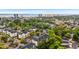 Overhead shot of residences surrounded by lush greenery with ocean skyline in the distance at 601 Hillside Dr. # 4233, North Myrtle Beach, SC 29582
