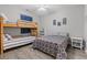 Spacious bedroom featuring a bunk bed, bed and light wood flooring at 601 Hillside Dr. # 4233, North Myrtle Beach, SC 29582