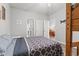 Cozy bedroom featuring a plush bed and easy access to the adjacent bathroom and dining area at 601 Hillside Dr. # 4233, North Myrtle Beach, SC 29582