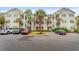 Inviting condominium complex featuring manicured landscaping and ample parking for residents and guests at 601 Hillside Dr. # 4233, North Myrtle Beach, SC 29582