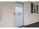 A charming front door with a decorative welcome sign and the house number displayed at 601 Hillside Dr. # 4233, North Myrtle Beach, SC 29582