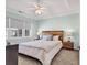 Calm bedroom with carpeted floors, a ceiling fan, and natural light from the window at 601 Hillside Dr. N # 3031, North Myrtle Beach, SC 29582