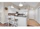 Bright kitchen with breakfast bar, granite counters, modern lighting and stainless appliances at 601 Hillside Dr. N # 3031, North Myrtle Beach, SC 29582
