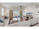 Relaxing living room with hardwood floors, comfortable seating, and access to outdoor space at 601 Hillside Dr. N # 3031, North Myrtle Beach, SC 29582