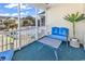 Inviting screened porch perfect for relaxation with comfortable seating and a community view at 601 Hillside Dr. N # 3031, North Myrtle Beach, SC 29582