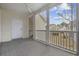 Relax on this screened porch with fan overlooking the lawn at 607 Sunnyside Dr. # 202, Murrells Inlet, SC 29576