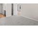 Spacious bedroom leading into a large walk-in closet and the bathroom area at 619 Castle Ct., Myrtle Beach, SC 29579