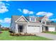Charming two-story home with a two-car garage, manicured lawn, and appealing curb appeal at 619 Castle Ct., Myrtle Beach, SC 29579