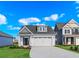 Charming single-Gathering home with a manicured lawn, a two-car garage, and stylish architectural detailing at 619 Castle Ct., Myrtle Beach, SC 29579