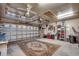 Spacious two-car garage with ample room for vehicles and storage, featuring a white door at 645 Twinflower St., Little River, SC 29566