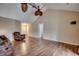 Bright living area with vaulted ceiling and wood flooring creates a modern space at 645 Twinflower St., Little River, SC 29566