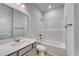 Bathroom featuring a tub shower, single vanity and bright lighting at 667 Mccorkle Place, Conway, SC 29526