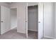 Neutral bedroom with a door leading to a walk-in closet and an additional door at 667 Mccorkle Place, Conway, SC 29526