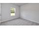 Bedroom featuring a window, neutral wall color, and plush carpeting at 667 Mccorkle Place, Conway, SC 29526
