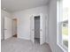 Bedroom featuring walk-in closet with storage and a window at 667 Mccorkle Place, Conway, SC 29526