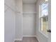 Walk-in closet with wire shelving and natural light from window at 667 Mccorkle Place, Conway, SC 29526