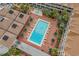 Aerial view of the condo community pool, complete with loungers and shady umbrellas at 6803 Ocean Blvd. N # 109, Myrtle Beach, SC 29572
