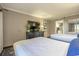 Double beds with dresser, sliding mirrored closet, and entry to kitchen at 6900 N Ocean Blvd. # 1235, Myrtle Beach, SC 29572