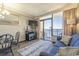 Cozy living room with a view of the ocean from the private balcony, along with comfortable sofa and dining table at 6900 N Ocean Blvd. # 1235, Myrtle Beach, SC 29572