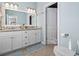 Bathroom features a double vanity with granite countertops, white cabinets, and a toilet at 799 Mount Gilead Place Dr., Murrells Inlet, SC 29576