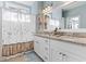 Bathroom featuring double vanity with granite countertop, white cabinets, and shower with curtain at 799 Mount Gilead Place Dr., Murrells Inlet, SC 29576