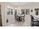 Charming dining area with a round table, natural light, and views of the outdoors at 799 Mount Gilead Place Dr., Murrells Inlet, SC 29576