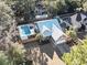 Aerial view of a beautiful single-Gathering home featuring a private pool, complemented by well-kept landscaping at 799 Mount Gilead Place Dr., Murrells Inlet, SC 29576