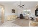 Cozy living room with vaulted ceiling, neutral paint, ceiling fan and comfortable seating at 799 Mount Gilead Place Dr., Murrells Inlet, SC 29576