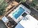 Aerial view of private swimming pool with a fenced yard, adjacent to a house and shed at 799 Mount Gilead Place Dr., Murrells Inlet, SC 29576