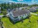 Aerial view of a well-maintained property with lush green lawns and a tree-lined neighborhood at 828 Sail Ln. # 203, Murrells Inlet, SC 29576