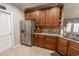 Kitchen featuring stainless steel refrigerator and granite counters at 828 Sail Ln. # 203, Murrells Inlet, SC 29576