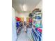 Tidy storage room with shelving, bikes, and neatly arranged containers and bins at 828 Sail Ln. # 203, Murrells Inlet, SC 29576