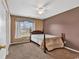 Cozy bedroom featuring neutral walls, carpet flooring and lots of natural light at 9514 Leeds Circle, Myrtle Beach, SC 29588