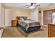 Comfortable bedroom with neutral walls and a view to the outside deck providing a peaceful retreat at 9514 Leeds Circle, Myrtle Beach, SC 29588