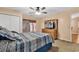 Well-lit bedroom with mirrored dresser and access to the backyard patio, perfect for relaxation at 9514 Leeds Circle, Myrtle Beach, SC 29588