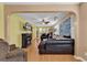 Spacious living room with hardwood floors and a cozy fireplace, perfect for relaxing at 9514 Leeds Circle, Myrtle Beach, SC 29588