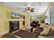 Spacious living room with hardwood floors and a cozy fireplace, creating a warm ambiance at 9514 Leeds Circle, Myrtle Beach, SC 29588
