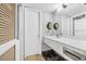 Bathroom featuring a washing machine, dryer, sink, mirror, and door at 9550 Shore Dr. # 1637/1638, Myrtle Beach, SC 29572