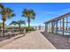 Exterior view with picnic tables and palm trees at 9550 Shore Dr. # 1637/1638, Myrtle Beach, SC 29572