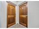 Condo hallway featuring two unit doors with electronic lock access at 9550 Shore Dr. # 1637/1638, Myrtle Beach, SC 29572