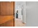 Condo hallway and entry featuring a solid wood entry door and tile flooring at 9550 Shore Dr. # 1637/1638, Myrtle Beach, SC 29572