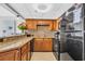 Open kitchen featuring granite counters and black appliances at 9550 Shore Dr. # 1637/1638, Myrtle Beach, SC 29572