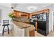 Open kitchen with granite counters and black appliances, perfect for entertaining at 9550 Shore Dr. # 1637/1638, Myrtle Beach, SC 29572