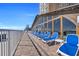 Resort pool deck with many lounge chairs and clear ocean views at 9550 Shore Dr. # 1637/1638, Myrtle Beach, SC 29572