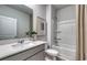 Bright bathroom features a shower-tub combo, modern vanity with a light countertop, and neutral decor at 971 Laconic Dr., Myrtle Beach, SC 29588