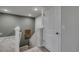 Hallway with carpet leading to a closed door and staircase at 971 Laconic Dr., Myrtle Beach, SC 29588