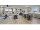Open-concept living and dining area with wood floors and access to the backyard at 971 Laconic Dr., Myrtle Beach, SC 29588