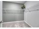 Empty walk-in closet with metal shelving, neutral colored walls and carpet at 971 Laconic Dr., Myrtle Beach, SC 29588