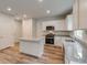 Modern kitchen featuring white cabinets, stainless steel appliances and granite countertops at 985 Laconic Dr., Myrtle Beach, SC 29588
